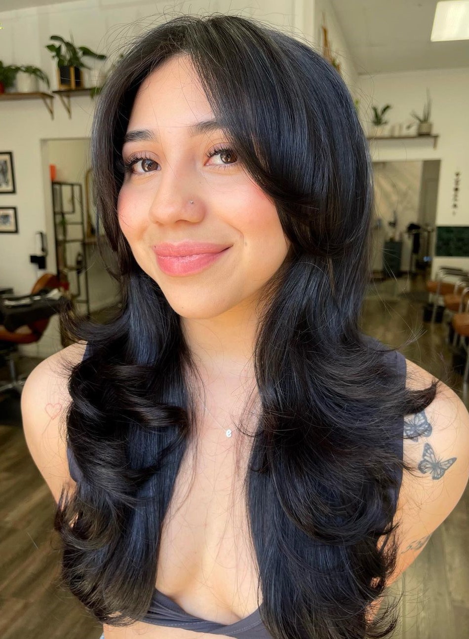 Curtain Bangs and Flipped-Up Layers Choppy Rounded Layers and Bangs on Long Hair