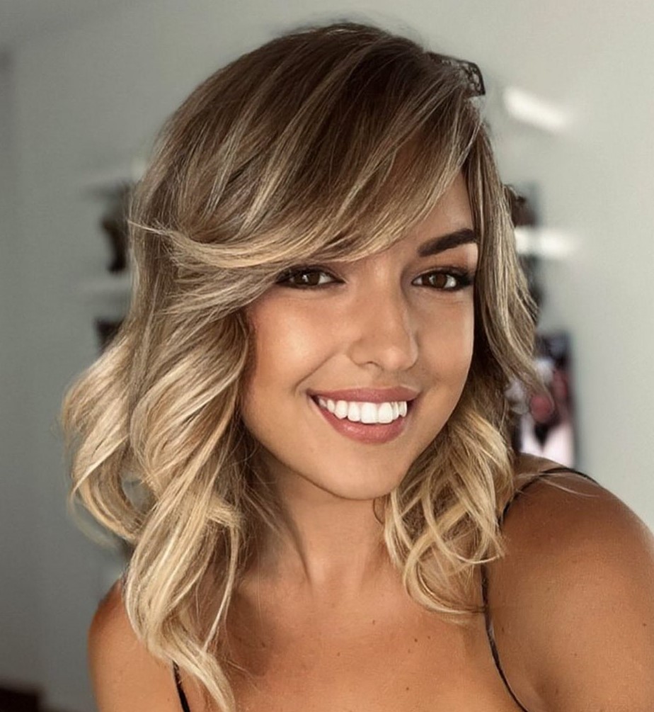 Collarbone Curls with Swoopy Bangs