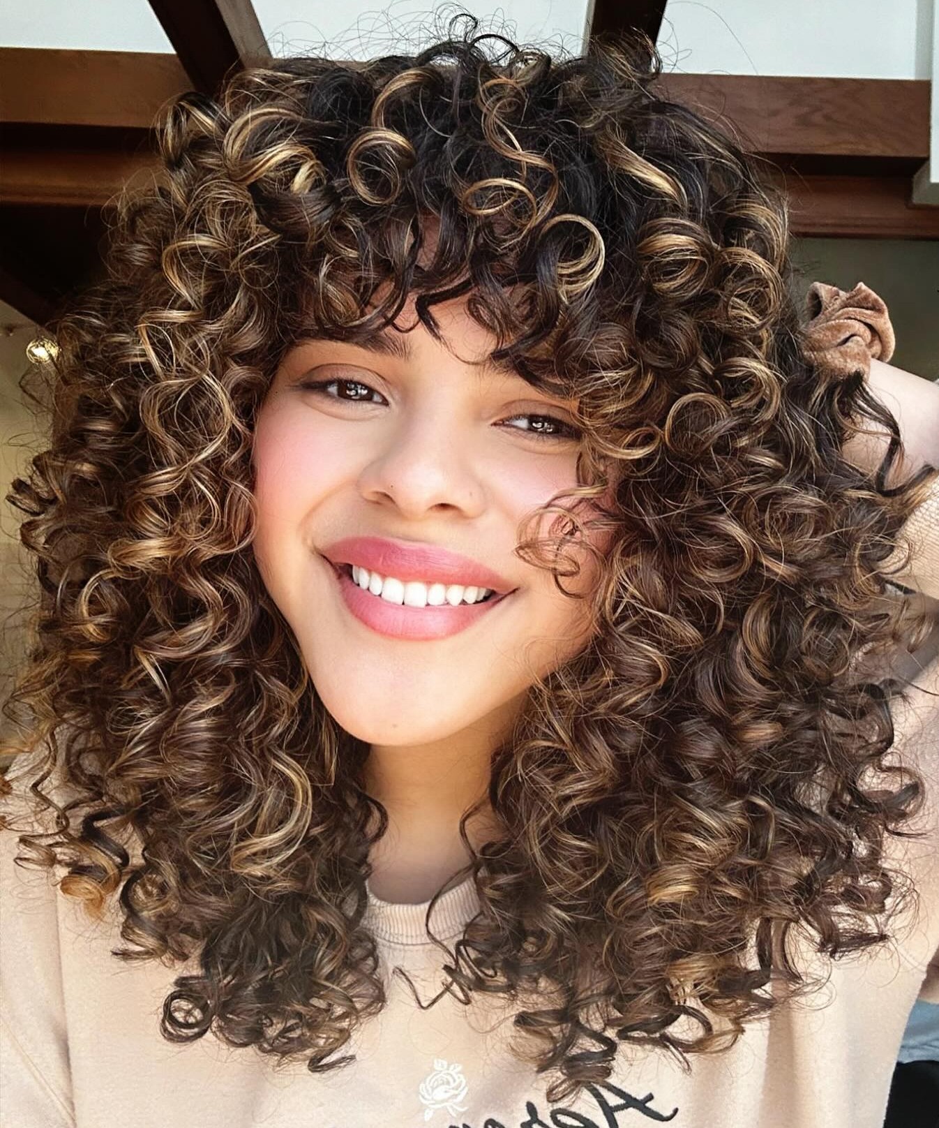 Natural Curly Hair with Highlights