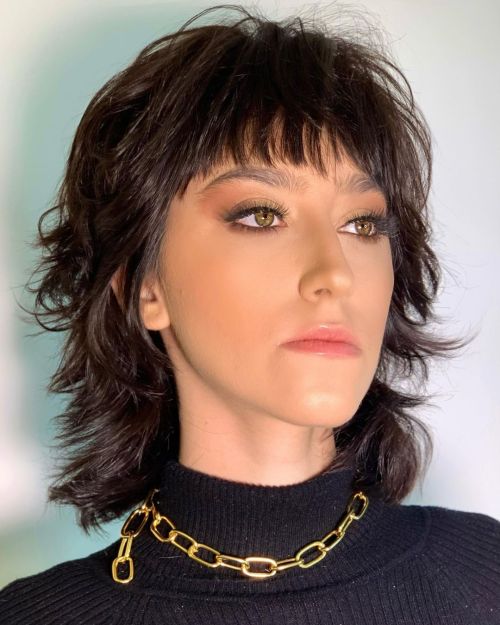 Striking Modern Mullet for Brown Hair Sassy Wolf Cut and Micro Bangs