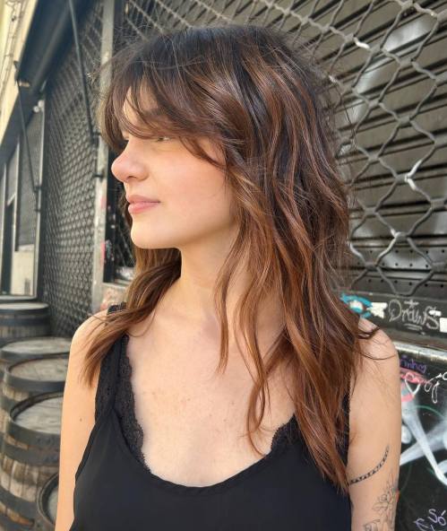 Long Haircut With Delicate Layers And Bangs