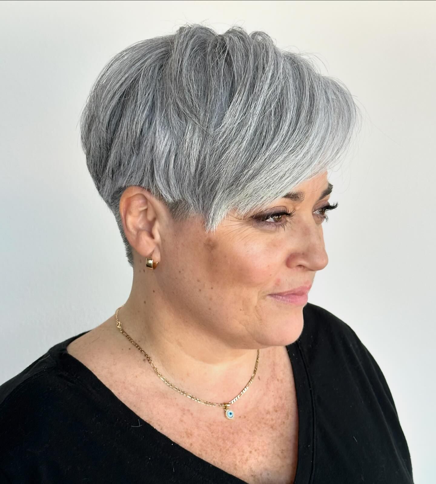 Gray Pixie with Taper Fade and Longer Side Bangs