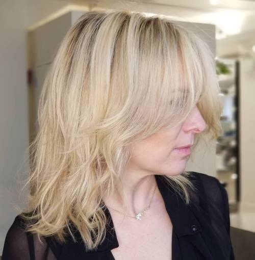 Vanilla Blonde Beachy Waves Tousled Beige Blonde Hairstyle