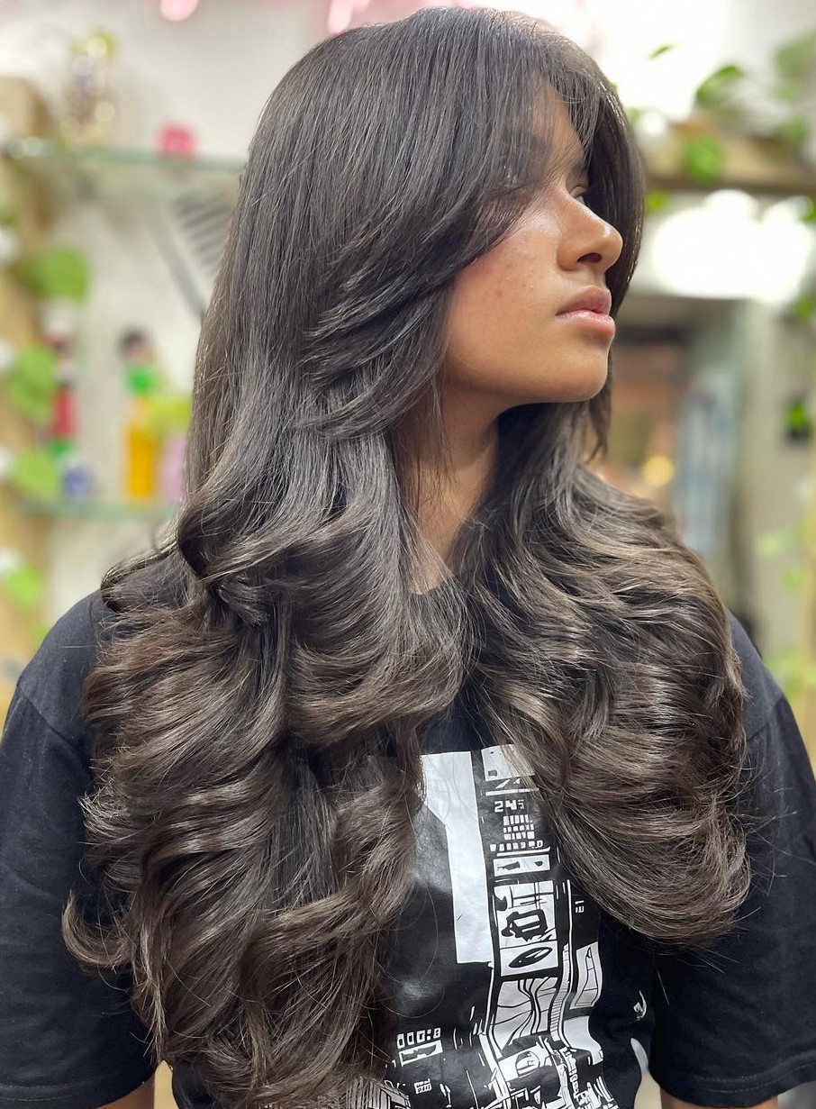 Softly Layered Long Curls Long Layered Hair with Body Wave and Layered Curtain Bangs