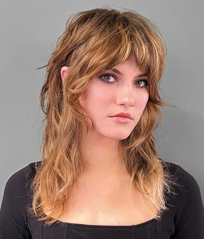 Wolf Cut with Bottleneck Bangs Classy Wolf Cut with Wavy Hair Texture