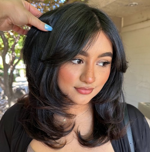 Medium Butterfly Haircut for Round Faces