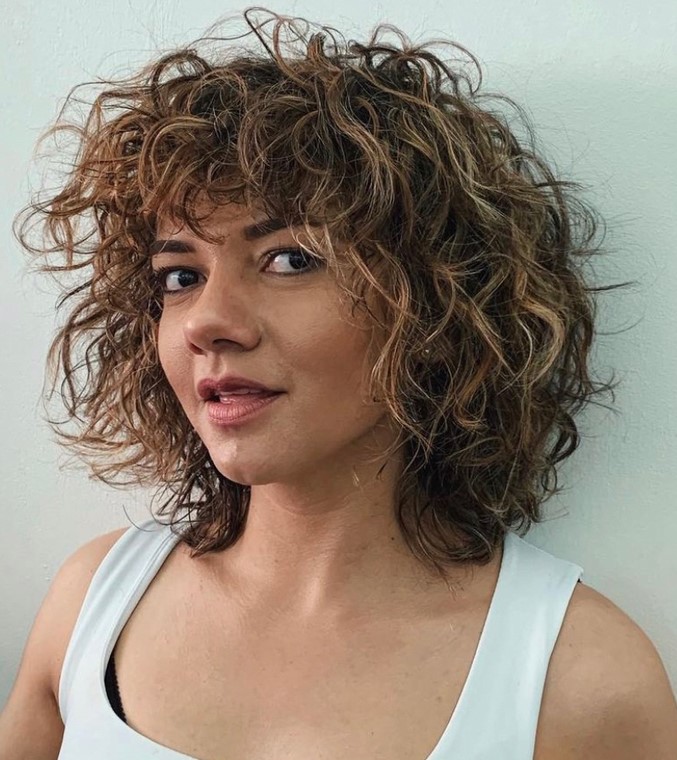Captivating Short Shaggy Hairstyle Choppy Curly Bob with Messy Curly Bangs