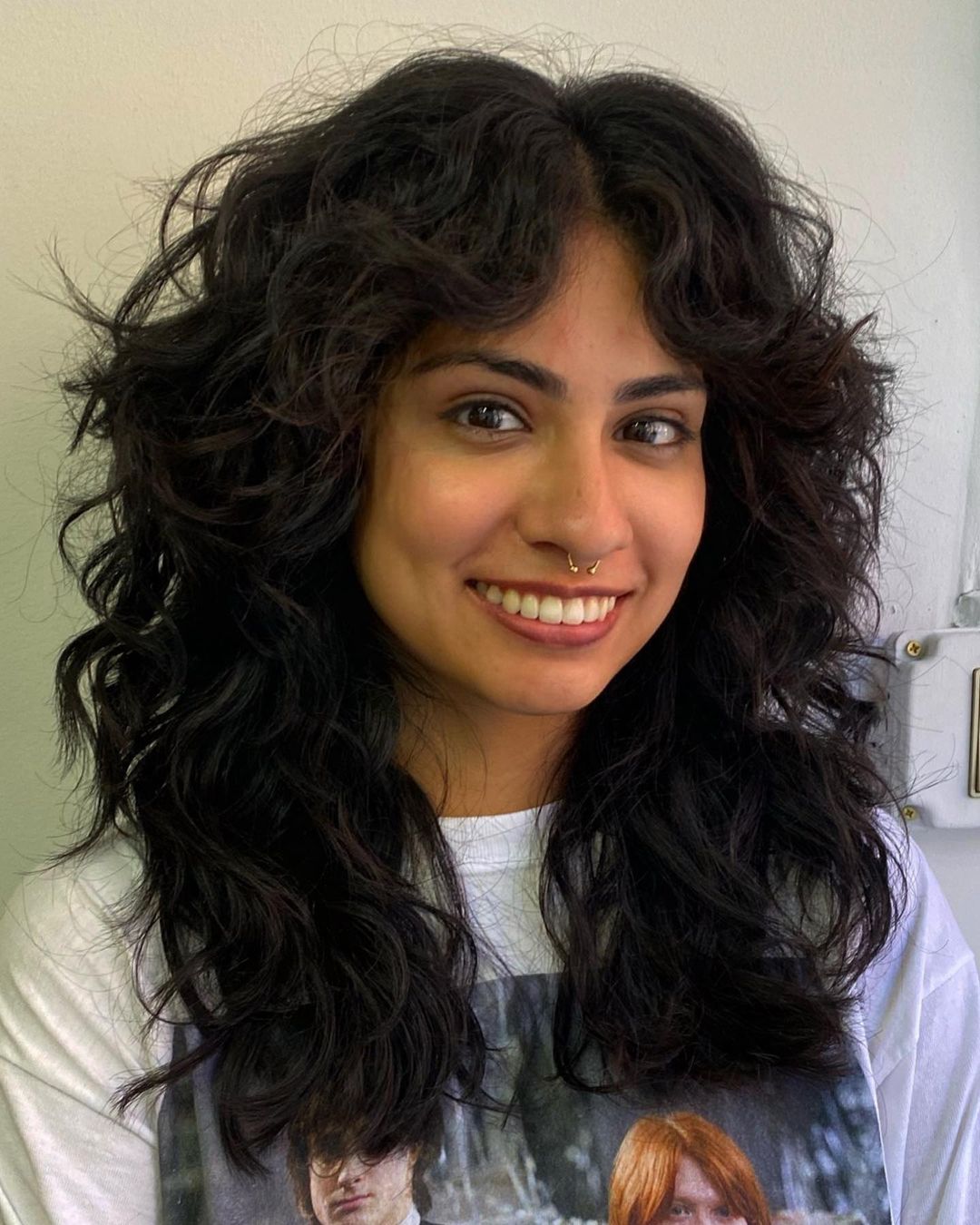 Playful Curly Bangs Curtain Bangs Hairstyle for Curly Hair