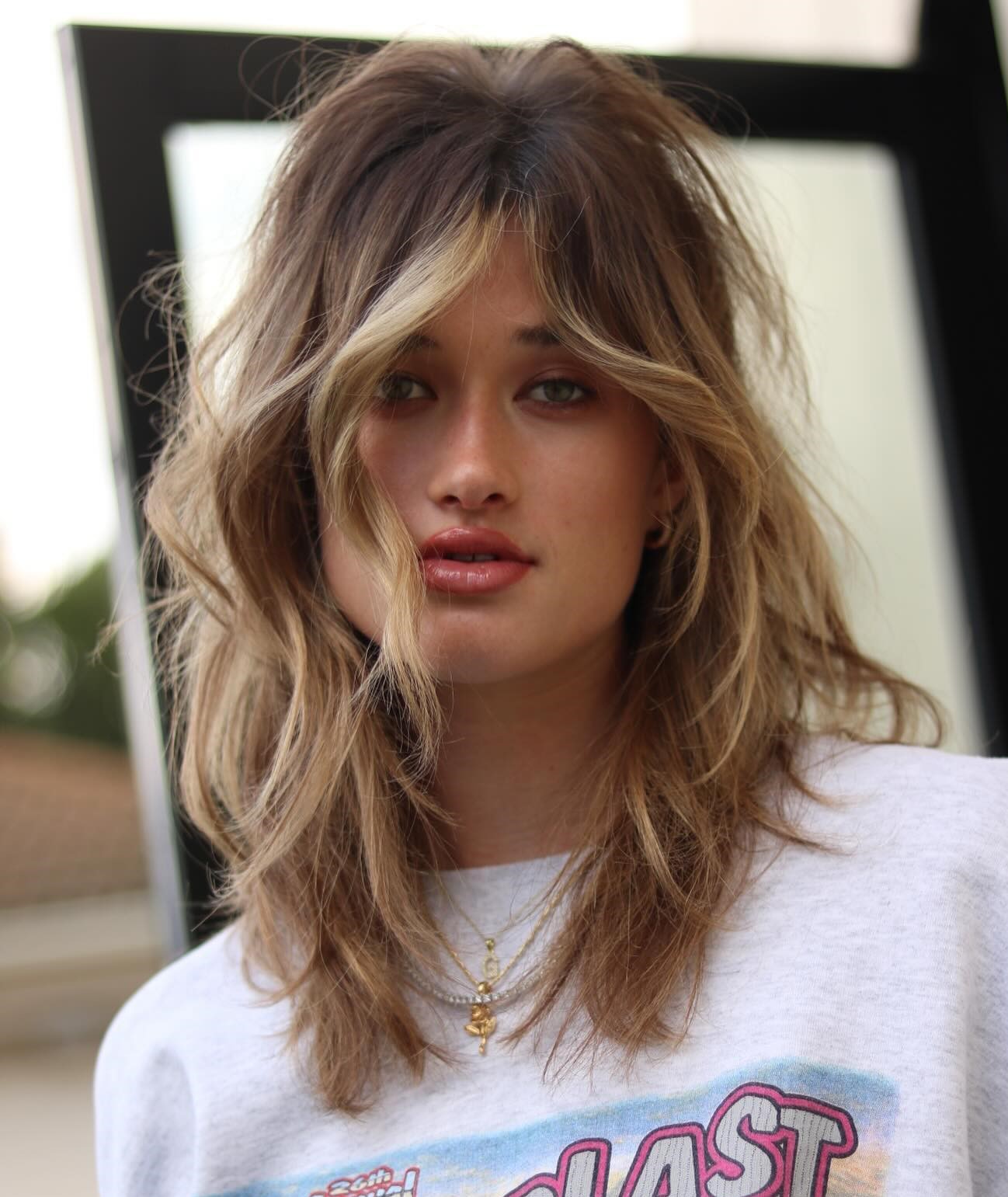 Tousled Medium Hairstyle with Face Framing Layers